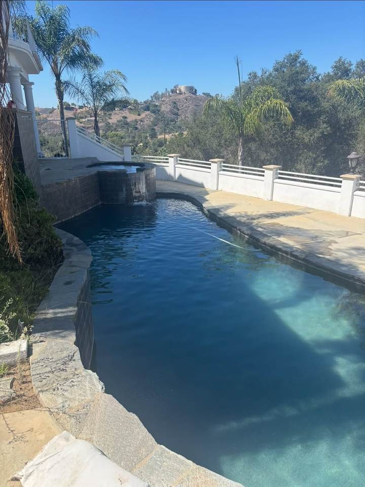 The same pool with clear water after the green pool cleanup
